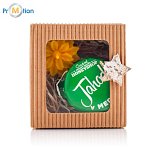 Gift box with candle and green honey