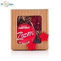 Gift box with candle and red honey