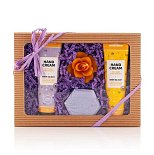 cosmetics on hand made of honey, gift set with printed logos