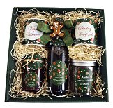 Christmas set Green Holidays with tea, syrup, almonds and jam, logo print