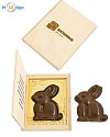 chocolate rabbit in a wooden box with his own logo